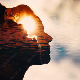 Sun peeks out from behind the clouds in woman's head.